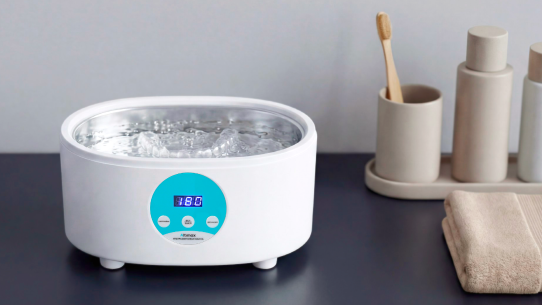 Ультразвуковая ванна: инновационный способ ухода за зубными протезами